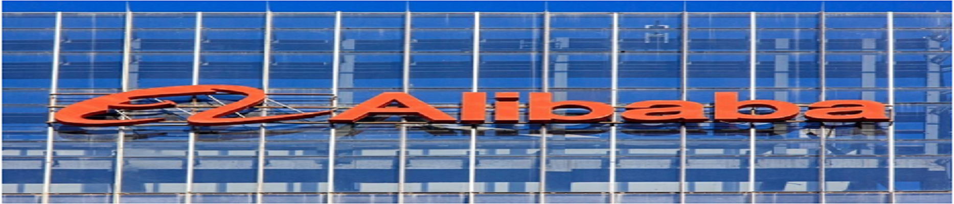 Large orange Alibaba logo on a building